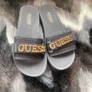 GUESS Black Slides with Gold Logo